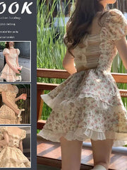 French Fashion Sweet Boat Neck Fragmented Flower Bubble Sleeve Dress Summer New Open Back Hollow Bow Slim Fit Design Skirt OUC5