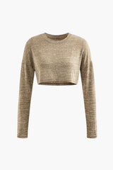 Set aus langärmligem Crop-Top aus Strick und Schlaghose mit Knoten vorne 