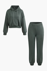 Einfarbiges Set mit Kapuzenpullover und Jogginghose 