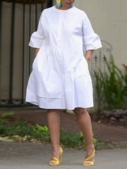 Loose Three-Quarter Sleeves Asymmetric Buttoned Pleated Pockets Solid Color Split-Joint Round-Neck Midi Dresses