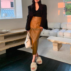 Mode-Outfits Brauner Lederrock für Damen 2024 Neuer Frühlings- und Herbstrock Mittellanger High-End-Sense Royal Sister A-Linien-Hüftrock Split-Rock
