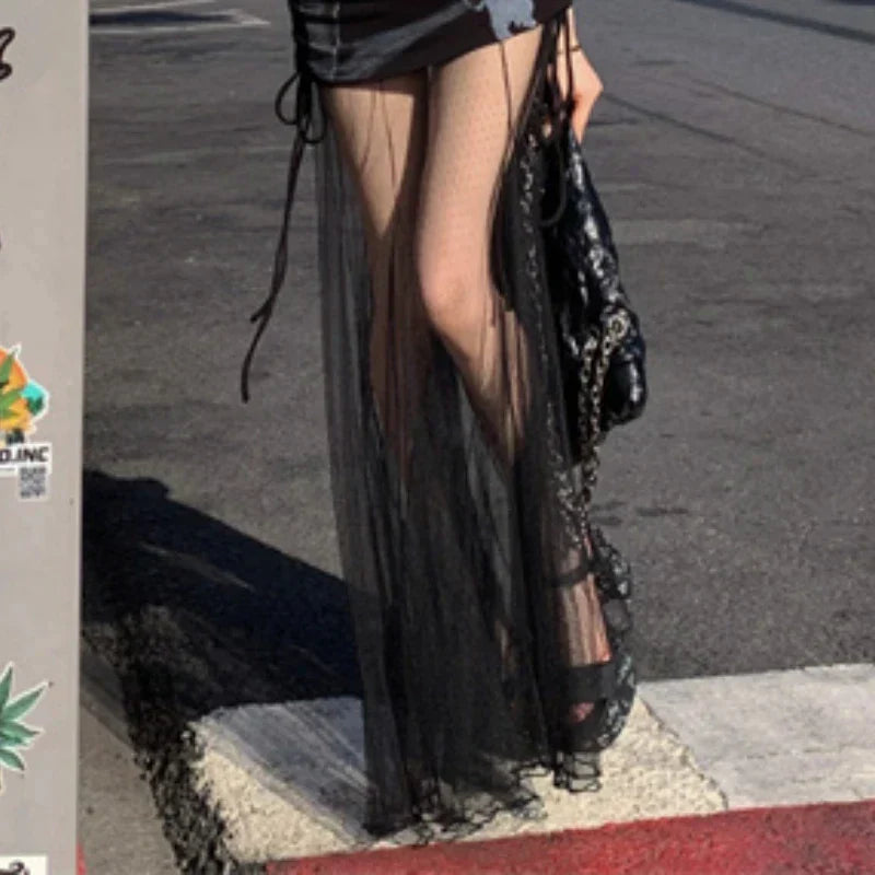 2024 Frühjahr neuer koreanischer hohler durchsichtiger Mesh-A-Linienrock für Damen + spitzes, gefaltetes, sexy Kleid mit Charakterdruck, zweiteiliger Anzug