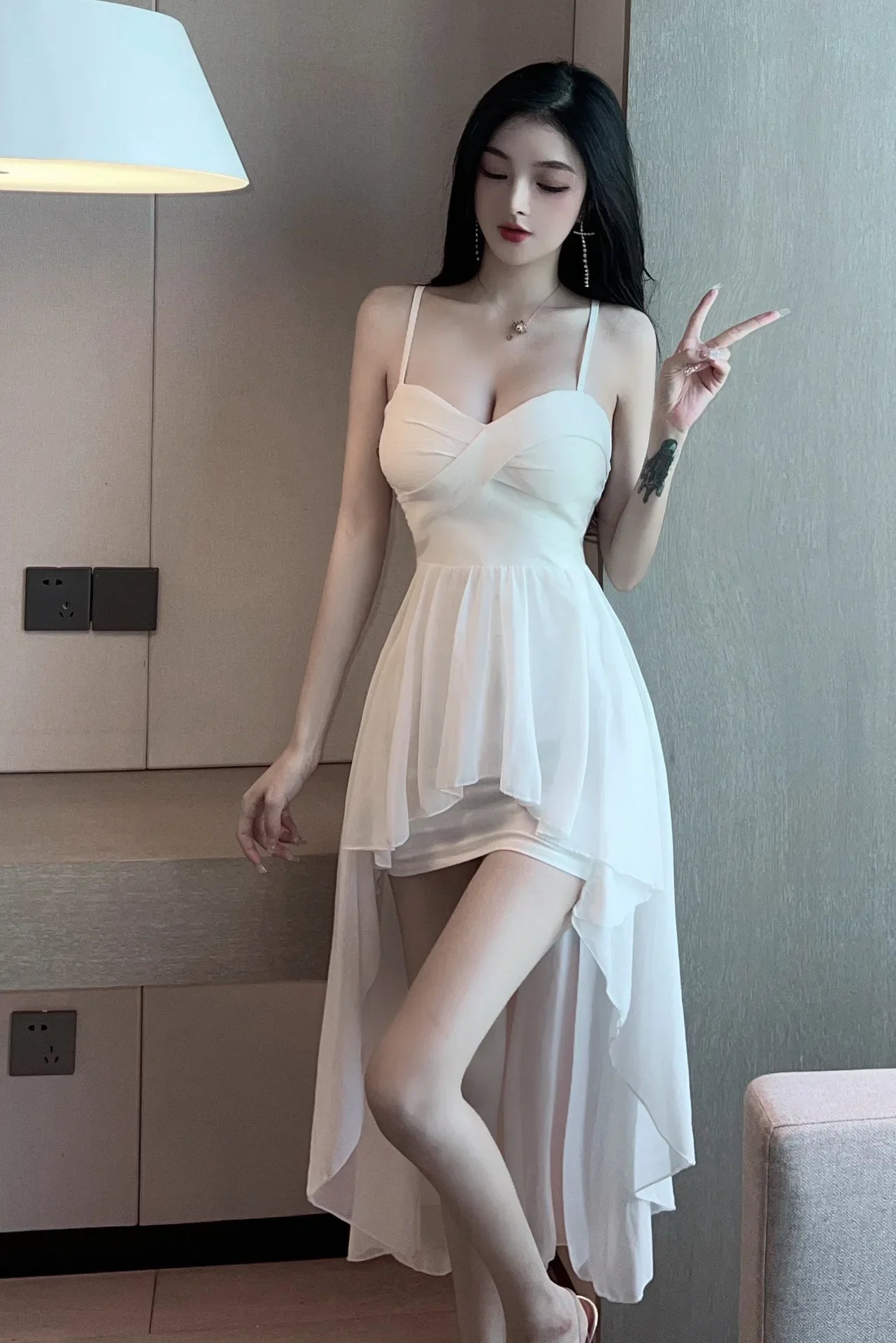 2025 Summer Women's New Sexy Sweet Irregular swing Swallowtail Slim sling Mid length Purity fashion Solid Color Dress ILGM