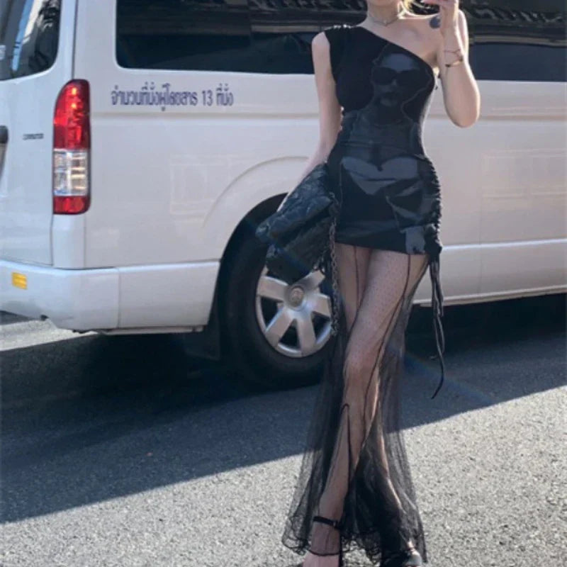 2024 Frühjahr neuer koreanischer hohler durchsichtiger Mesh-A-Linienrock für Damen + spitzes, gefaltetes, sexy Kleid mit Charakterdruck, zweiteiliger Anzug