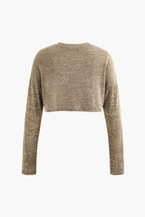 Set aus langärmligem Crop-Top aus Strick und Schlaghose mit Knoten vorne 